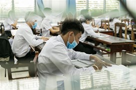老挝学生陆续返校复课