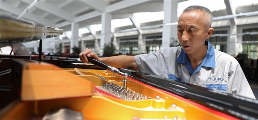 一台“中国造”钢琴的诞生——走进70年历史的东北钢琴厂
