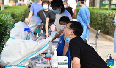 Beijing continues to find scattered infections