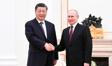 Xi meets Putin in Moscow