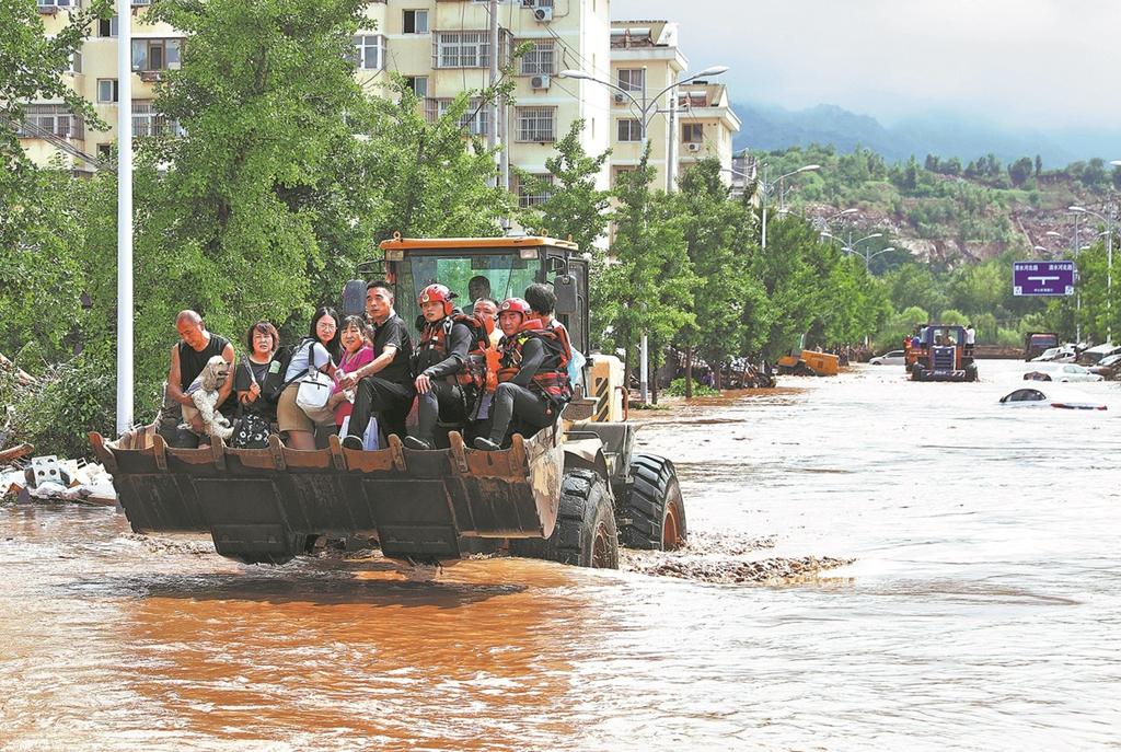 Xi urges all-out flood relief efforts