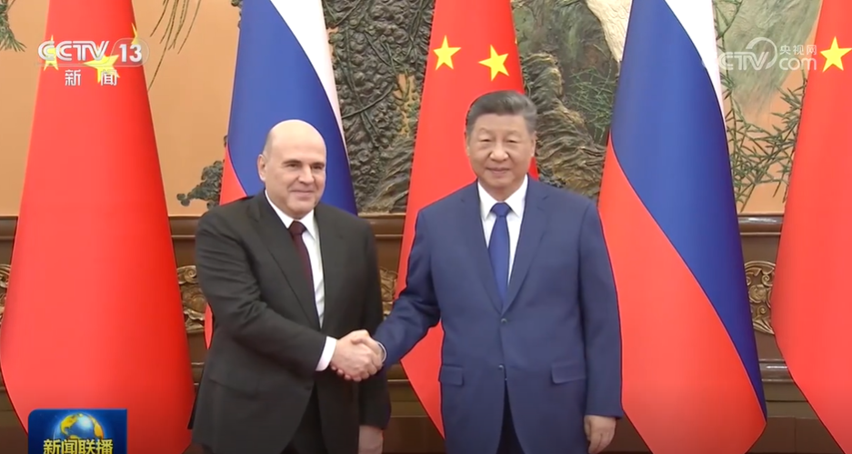 Xi calls for better synergy with Russia