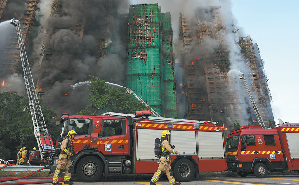 Huge blaze engulfs residential area in Hong Kong