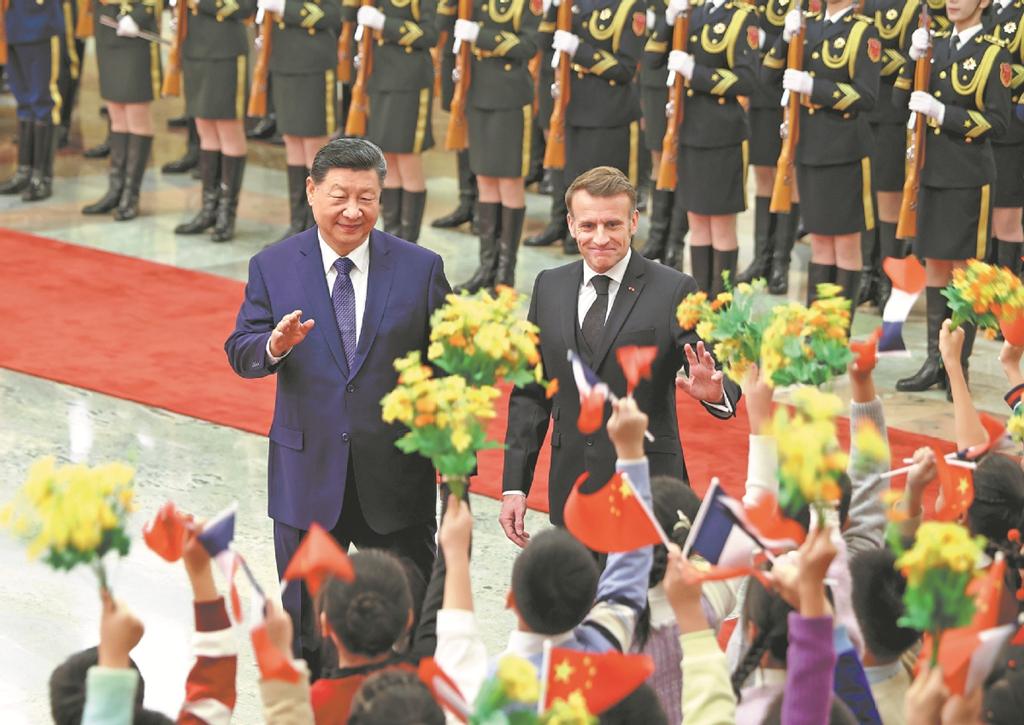 Xi, Macron vow to deepen relations