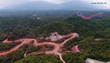 1st China-Laos railway tunnel holing through