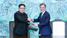 Moon, Kim pledge complete denuclearization, signing truce into peace pact by 201