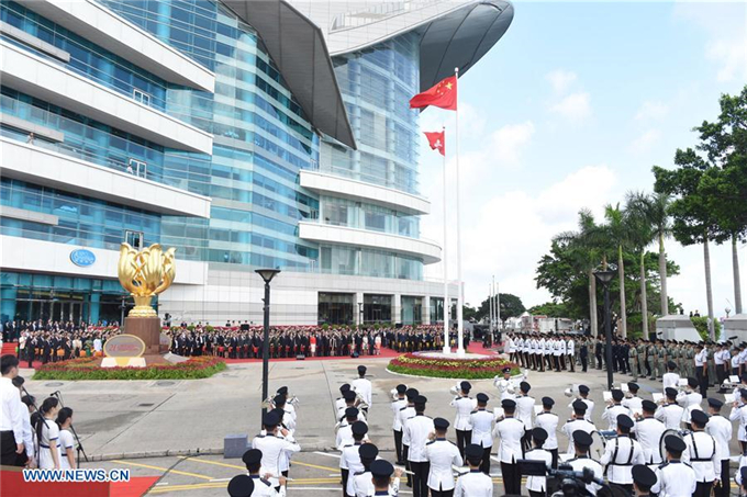 Flag-raising ceremony held to celebrate 21st anniv. of HK's return to motherland