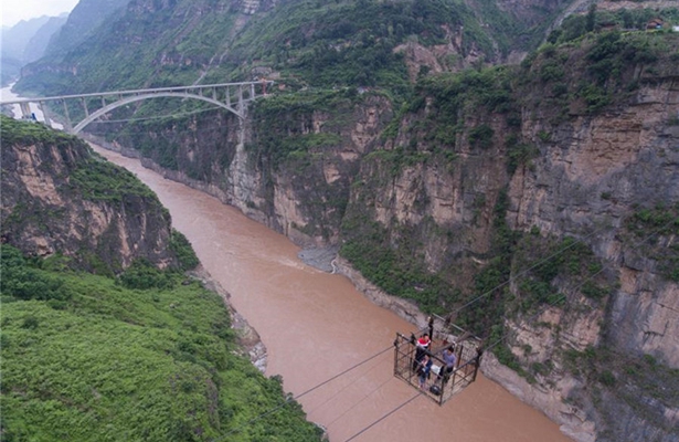 Poverty-stricken villagers say goodbye to terrifying ropeways