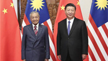 Xi meets Malaysian PM, calling for better ties in new era