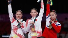 China wins 2 more gymnastics golds at Jakarta Asiad