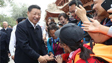 Xi highlights poverty relief, high-quality development, environmental protection