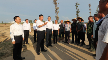 Xi's visit to flood-stricken areas embodies 