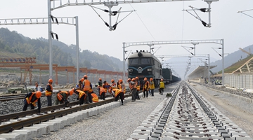 Rails half-laid on Yunnan section of China-Laos line