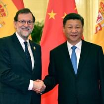 习近平会见西班牙首相拉霍伊