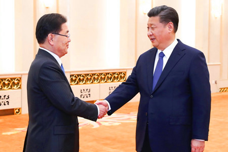 习近平会见韩国总统特使郑义溶