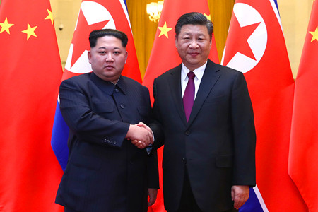 习近平同金正恩举行会谈
