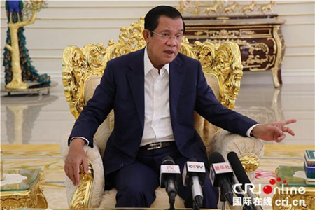 新中国为地区和世界的繁荣发展发挥了重要作用——访柬埔寨首相洪森