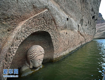 江西南城一水库发现摩崖造像 “佛头”遗迹浮出水面