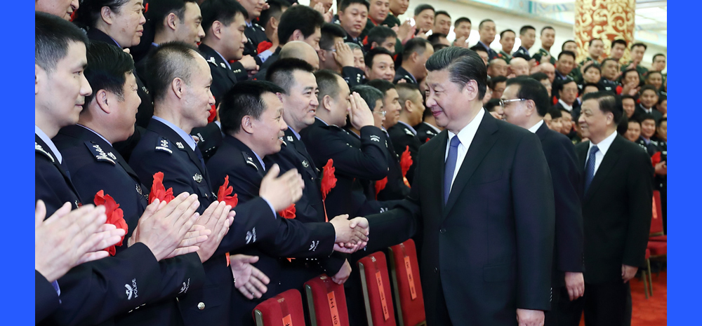 习近平等会见出席全国公安系统英雄模范立功集体表彰大会代表
