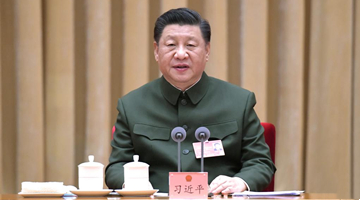 Xi stresses running military in accordance with law