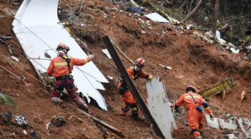 Searchers find debris, crew items, some remains in center of crash site