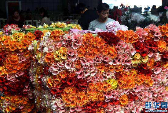 ตลาดดอกไม้สดที่เมืองฤดูใบไม้ผลิ(เมืองคุนหมิง)การค้าขายดี